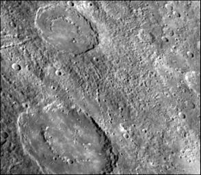 PIA02423: Crater Chain Groves Inside Larger Craters