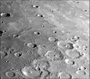 PIA02438: Heavily Cratered Terrain and Smooth Plain