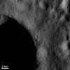 PIA15516: Blocks of Ejected Material and Small Craters Near a Crater Rim